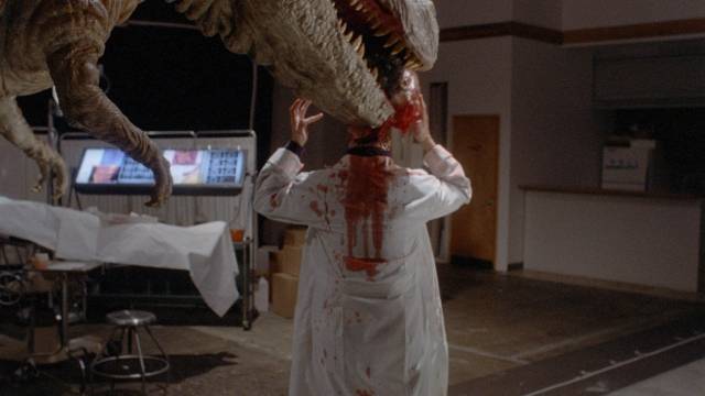 Michael (Paul Walker) is ticked off when he wakes up inside a robotic dinosaur in Tammy and the T-Rex (1994)