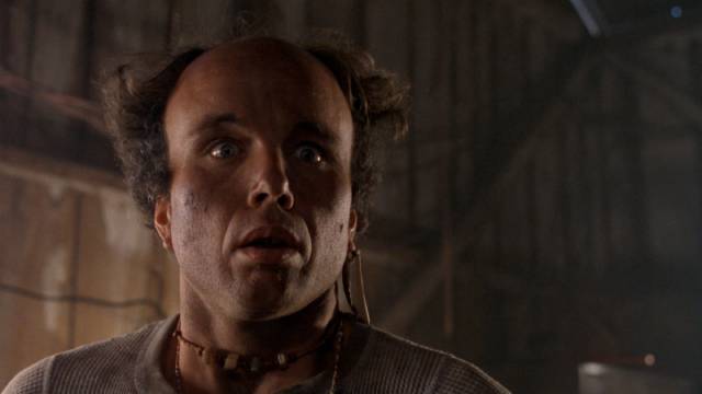 Grow-op caretaker Jarvis Tanner (Clint Howard) discovers he should have been more careful with the chemicals in Tony Randel's Ticks (1993)