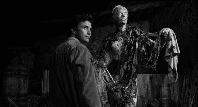 Artist Roberto Merigi (Anthony Seffen) restores a cursed statue in Camillo Mastrocinque's An Angel for Satan (1966)