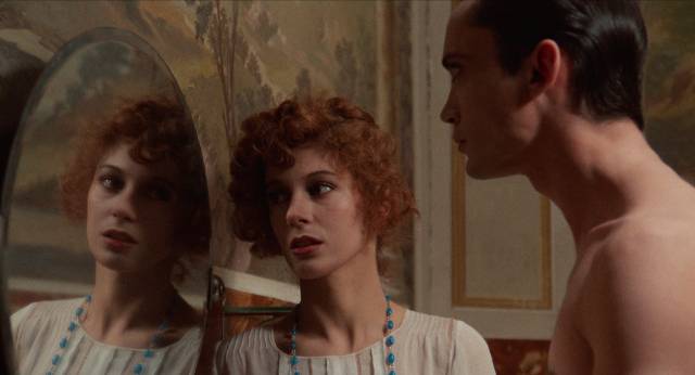 Rubinia (Stefania Casini) realizes that the Count (Udo Kier) has no reflection in Paul Morrissey's Blood for Dracula (1974)