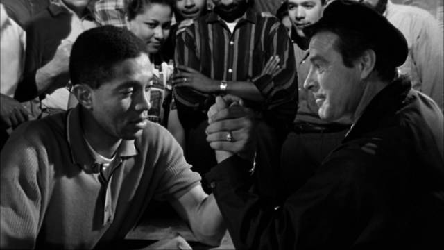 Al Pereira (Conrado San Martin) makes friends in Jess Franco's Death Whistles the Blues (1962)