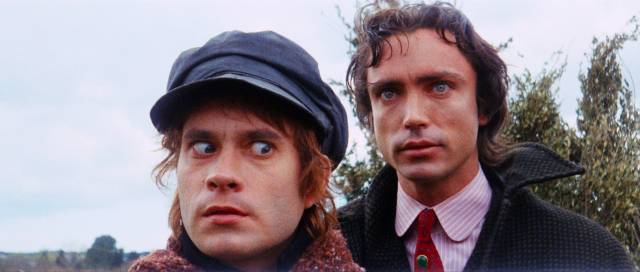 The Baron (Udo Kier) and Otto (Arno Jürging) visit a brothel in search of the right male specimen in Paul Morrissey's Flesh for Frankenstein (1973)