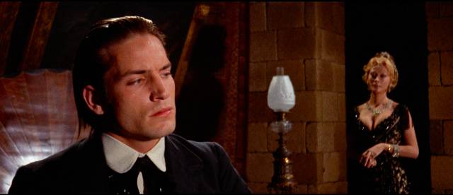 Working class Nicholas (Joe Dallesandro) doesn't conceal his contempt for his employer in Paul Morrissey's Flesh for Frankenstein (1973)