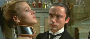 The Baron (Udo Kier) contemplates his female creature (Dalila Di Lazzaro) in Paul Morrissey's Flesh for Frankenstein (1973)