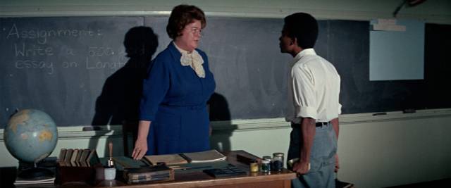 Newt (Kyle Johnson) confronts the teacher (Peggy Rea) who tells him Black kids don't need an education in Gordon Parks' The Learning Tree (1969)