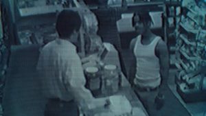 O-Dog (Larenz Tate) confronts a convenience store owner he's about to kill in the Hughes Brothers' Menace II Society (1993)