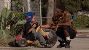 Caine (Tyrin Turner) is ill-equipped to look out for Ronnie (Jada Pinkett)'s son's best interests in the Hughes Brothers' Menace II Society (1993)