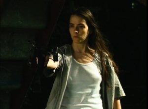 Susan (Stark Raven) navigates a world populated by the unemployed dead in Scooter McCrae's Shatter Dead (1994)