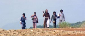 Cheng Shang-Kuan (Jack Long) and his entourage traverse China for a series of challenges in Joseph Kuo's The 7 Grandmasters (1977)