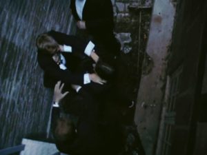 Michael (Thomas Bo Larsen) and others use violence to keep Christian (Ulrich Thomsen) from returning to the party in Thomas Vinterberg's Festen (The Celebration, 1998)