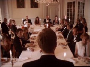 Gathered friends and family listen awkwardly to Christian's revelation of childhood abuse in Thomas Vinterberg’s Festen (The Celebration, 1998)