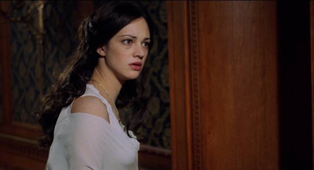 Christine Daaé (Asia Argento) hears a spectral voice in Dario Argento's The Phantom of the Opera (1998)