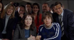 The whole squad gets excited when they think their guy is winning the on-line poker game in Dario Argento's The Card Player (2004)