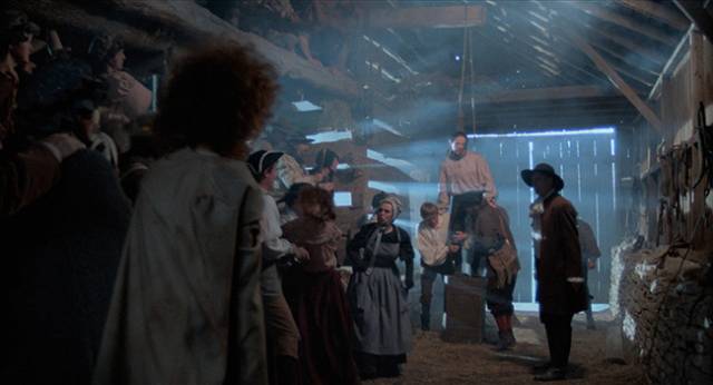 Angry settlers prepare to lynch Pastor Will Smythe (Dennis Lipscomb) in Avery Crounse’s Eyes of Fire (1983)