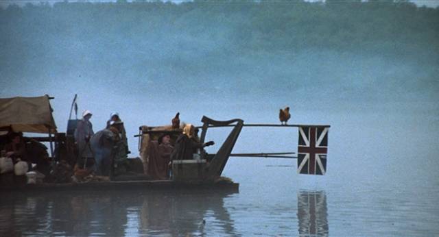 A breakaway group led by Pastor Will Smythe (Dennis Lipscomb) head downstream in Avery Crounse's Eyes of Fire (1983)