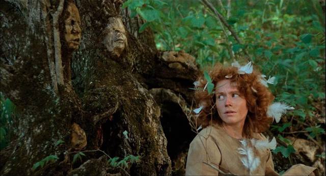 Leah (Karlene Crockett) is surrounded by the spirits of those captured by the Witch in Avery Crounse’s Eyes of Fire (1983)