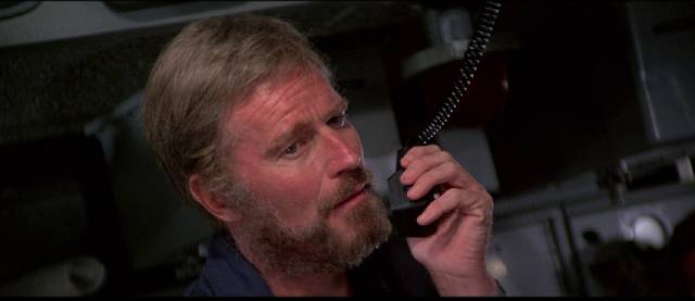 Captain Paul Blanchard (Charlton Heston) does what he can for his trapped crew in David Greene's Gray Lady Down (1978)