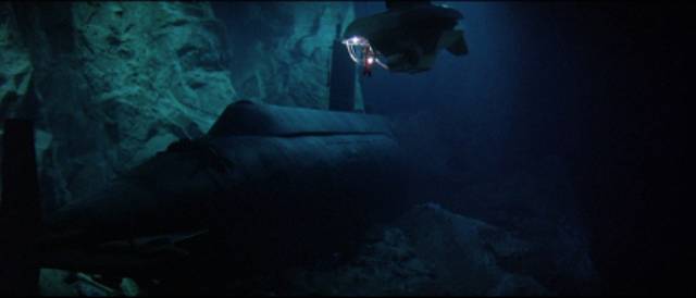 The USS Neptune rests on an unstable ledge in David Greene's Gray Lady Down (1978)