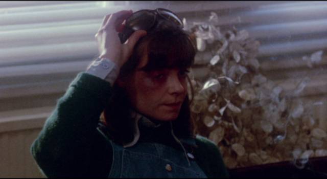 Working-class Millie (Jenny Twigge) displays the results of a beating in Gerry O'Hara's The Brute (1977)