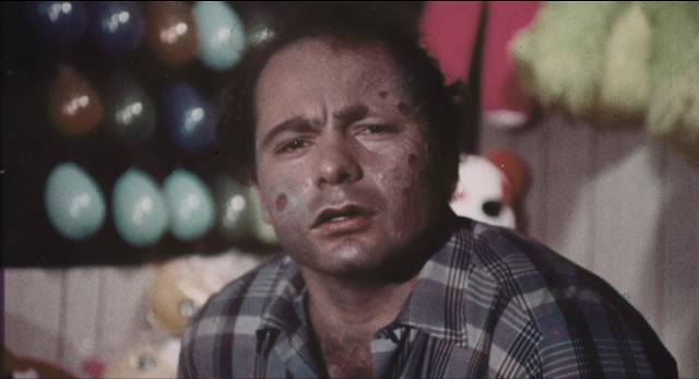 Burt Young makes his movie debut as sideshow sidekick Gimpy in Leonard Kirtman’s Carnival of Blood (1970)