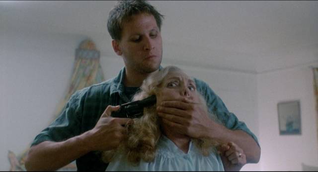 Escaped killer Bob (John Putch) returns home to get revenge in Gary Winick's Curfew (1989)