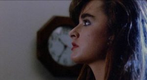 Precocious teen Stephanie Davenport (Kyle Richards) takes on murderous brothers in Gary Winick's Curfew (1989)