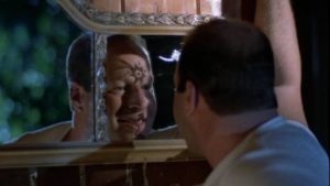 Kirk Smith (Nicholas Worth) tries to find himself in a mirror in Robert Hammer's Don't Answer the Phone! (1979)