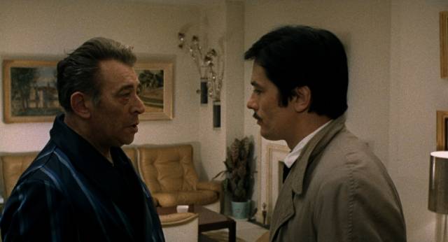 Corey (Alain Delon) visits his old partner in crime Rico (André Ekyan) in Jean-Pierre Melville's Le cercle rouge (1970)
