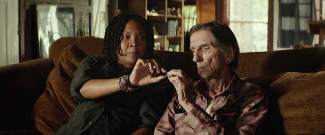 Diner waitress Loretta (Yvonne Huff Lee) offers Lucky (Harry Dean Stanton) a joint in John Carroll Lynch's Lucky (2017)