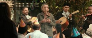 Lucky (Harry Dean Stanton) sings an emotional song in Spanish at Bibi's son's 10th birthday party in John Carroll Lynch's Lucky (2017)