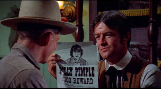 Cass (Richard Lapp) learns the identity of the man he met in the desert in Budd Boetticher's A Time for Dying (1969)