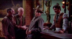Cass (Richard Lapp) tries to impress people in the saloon with his cool gunplay in Budd Boetticher's A Time for Dying (1969)