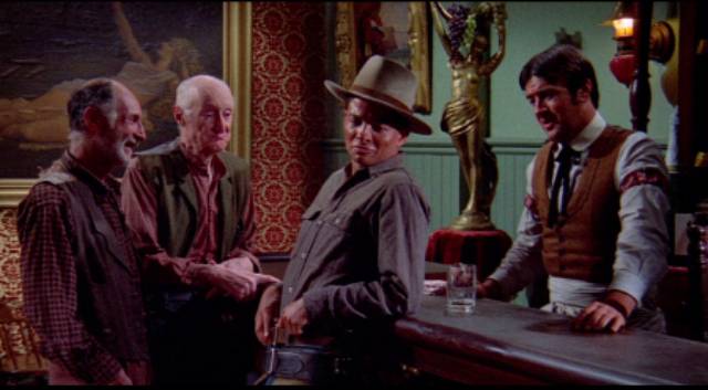 Cass (Richard Lapp) tries to impress people in the saloon with his cool gunplay in Budd Boetticher's A Time for Dying (1969)