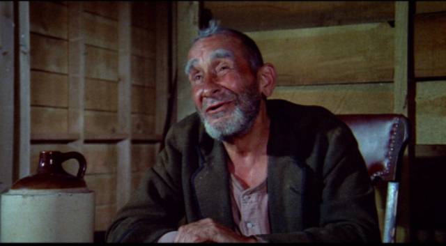 Judge Roy Bean (Victor Jury) passes sentence on a boy accused of horse theft in Budd Boetticher's A Time for Dying (1969)