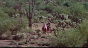 Cass (Richard Lapp) and Nellie (Anne Randall), newly married, set out to find a life together in Budd Boetticher's A Time for Dying (1969)