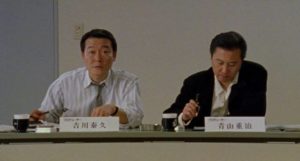 Widower Aoyama (Ryo Ishibashi) seeks a new partner with the help of his colleague Yoshikawa (Jun Kunimura) in Takashi Miike's Audition (1999)