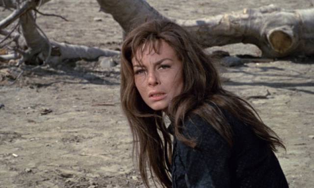 Maria (Michele Mercier) seeks vengeance against the men who lynched her husband in Robert Hossein's Cemetery Without Crosses (1969)
