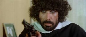 Petty criminal Monnezza (Tomas Milian) is roped into a dangerous police investigation in Umberto Lenzi's Free Hand for a Tough Cop (1976)
