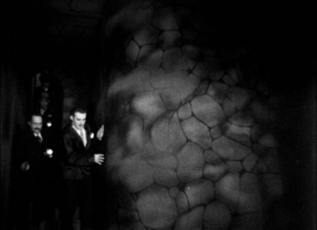 Police discover a secret cellar beneath the Acuna house in Ramon Peon's La llorona (1933)