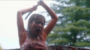 Fighting zombies drives Chinatsu (Yuzuki Akiyama) to madness in Shin’ichiro Ueda’s One Cut of the Dead (2017)