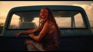 Sally (Marilyn Burns) escapes alive but not undamaged in Tobe Hooper's The Texas Chain Saw Massacre (1974)