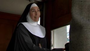 Sister Cecelia (Mary Woronov) worships the Great Old Ones in Kenneth J. Hall's The Halfway House (2004)