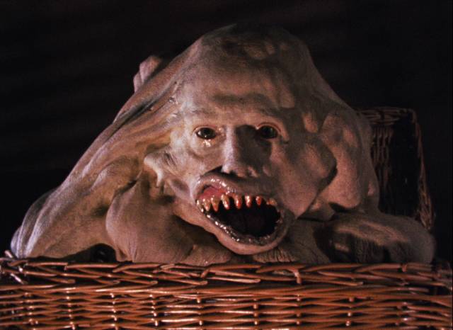 Conjoined twin Belial is pissed off in Frank Henenlotter's Basket Case (1981)