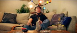 Relaxing with the Cap'n Video lighting gear headwear in Jay Cheel's Beauty Day (2011)