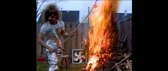 Cap'n Video with some hotdogs at a backyard cook-out in Jay Cheel's Beauty Day (2011)