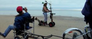 Cap'n Video (Ralph Zavadil) shooting the comeback special on his homemade scooter in Jay Cheel's Beauty Day (2011)