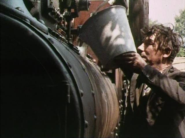 Peter coaxes the old traction engine back to life in Philip Trevelyan's The Moon & the Sledgehammer (1971)