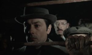 Robert Klein (Alain Delon) takes the place of the other Klein on the transport to Auschwitz in Joseph Losey's Mr. Klein (1976)