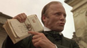 William Walker (Ed Harris) displays the letters which protected him from an assassin's bullet in Alex Cox's Walker (1987)