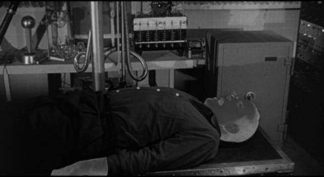Joey Faust (Douglas Kennedy) becomes invisible in Edgar G. Ulmer's The Amazing Transparent Man (1960)